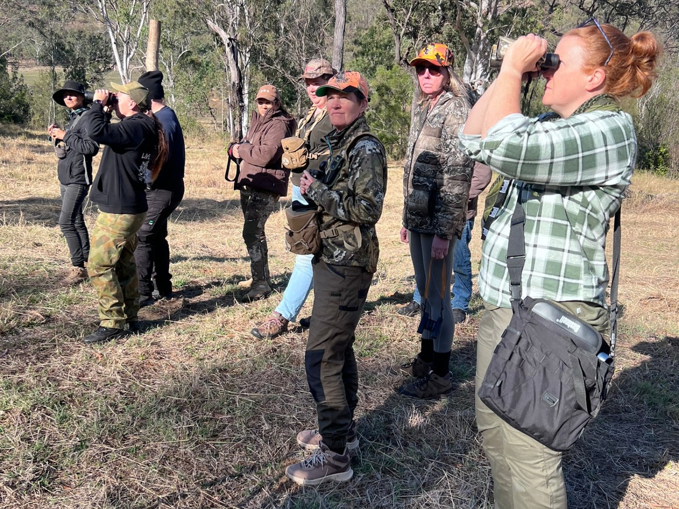 Women learning field observation skills together during a Women Who Hunt weekend.