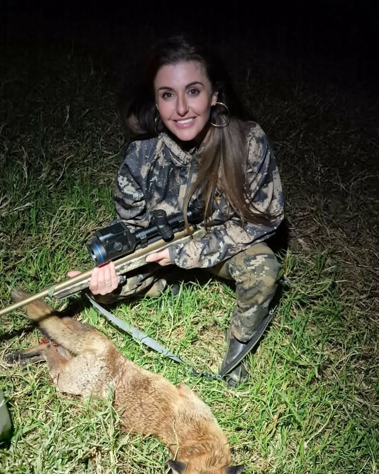 Melissa out at night with her rifle after taking a fox